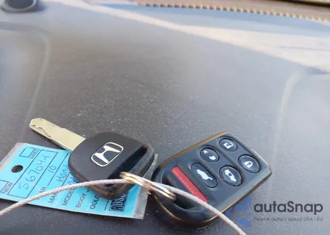 2010 Honda Odyssey Ex-L z USA, uszkodzony, nr VIN 5FNRL3H7XAB069685